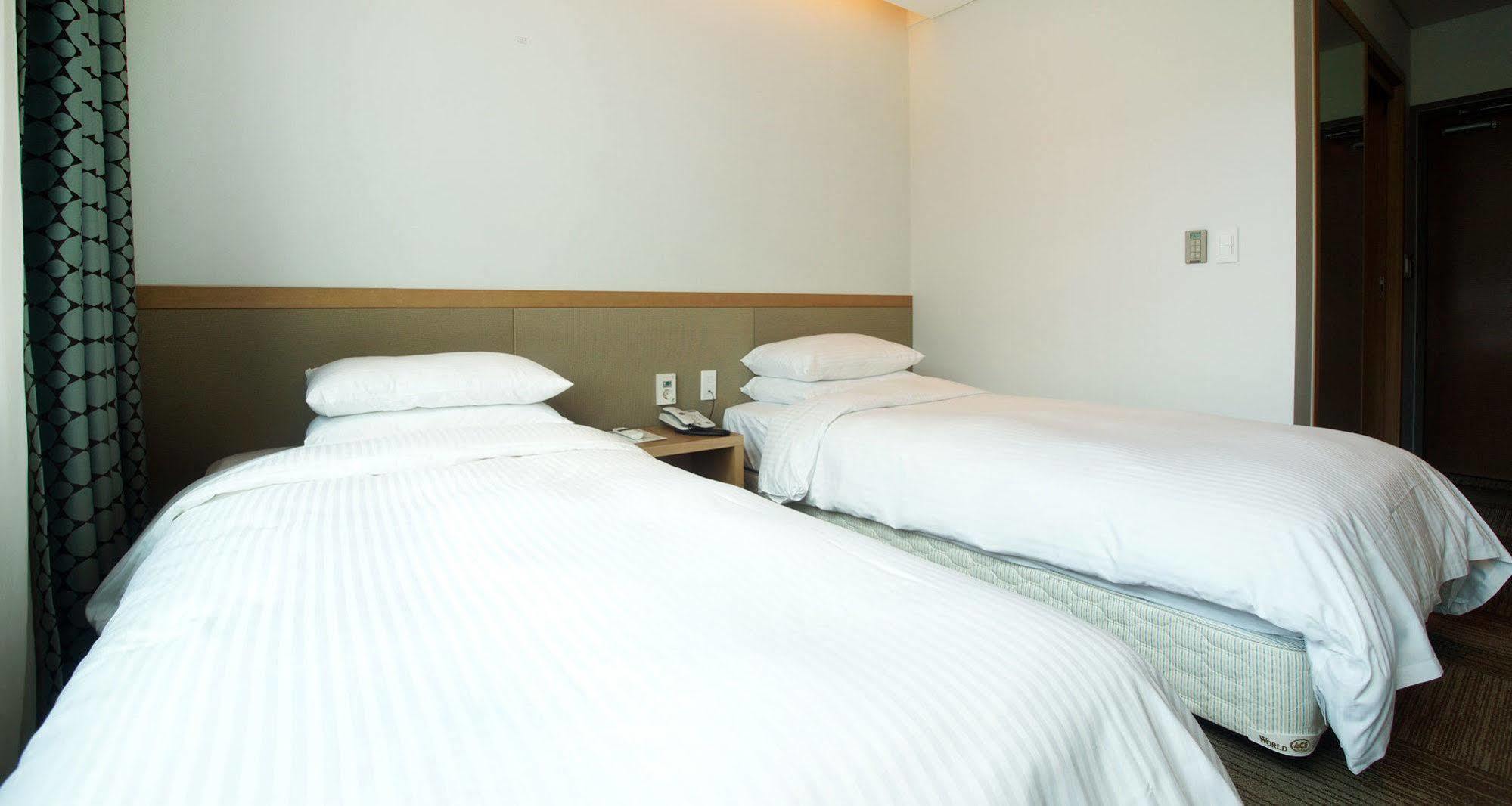 Jeju Poong Gyung Hotel Seogwipo Exterior foto